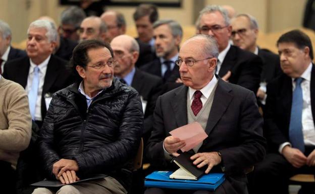 El expresidente de Bankia Rodrigo Rato (derecha) junto al exconsejero de Caja Madrid José Antonio Moral Santín.