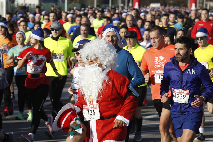 Fotos: ¿Estuviste en la Carrera Ppopular de Nochebuena? ¡Búscate!