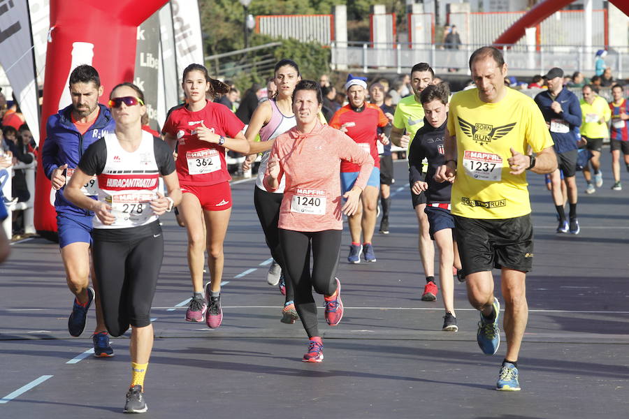 Fotos: ¿Estuviste en la Carrera Ppopular de Nochebuena? ¡Búscate!