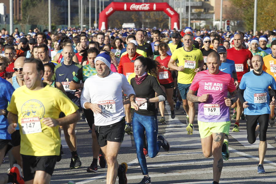 Fotos: ¿Estuviste en la Carrera Ppopular de Nochebuena? ¡Búscate!