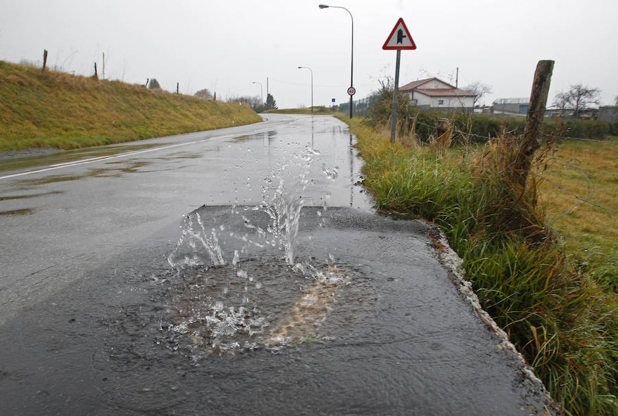 Fotos: La lluvia se ceba con la capital asturiana