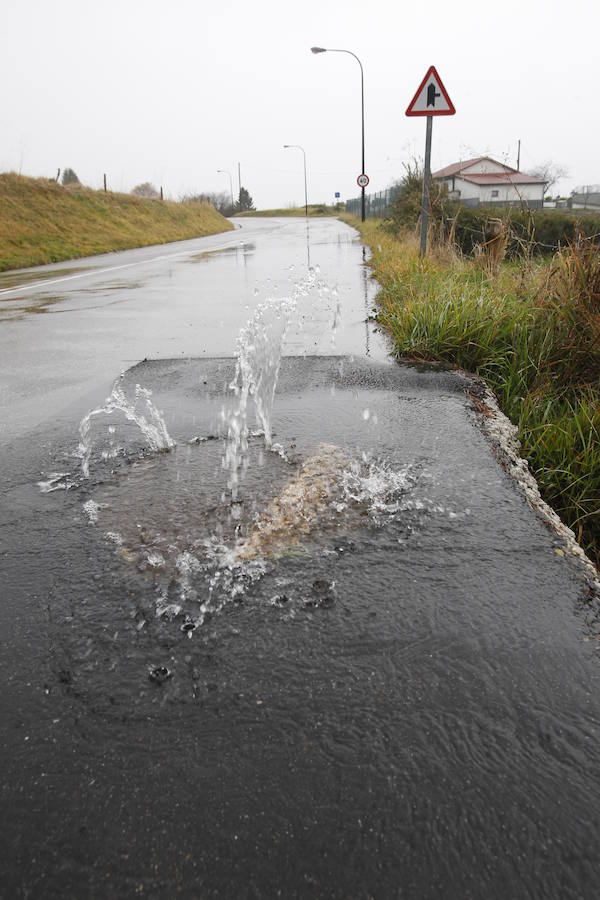 Fotos: La lluvia se ceba con la capital asturiana