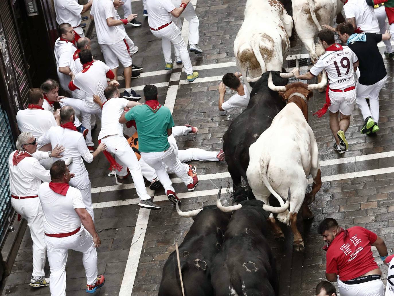 Fotos: Las imágenes que ha dejado el primer encierro de los Sanfermines 2019