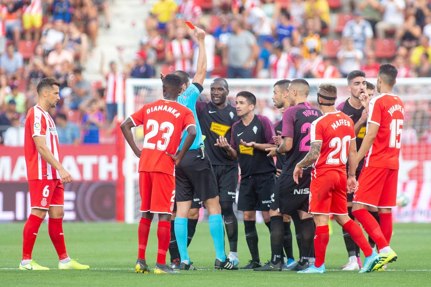 El Sporting consiguió un meritorio empate en Montilivi. Los rojiblancos jugaron gran parte de la segunda mitad con un futbolista menos por la expulsión de Damián. 