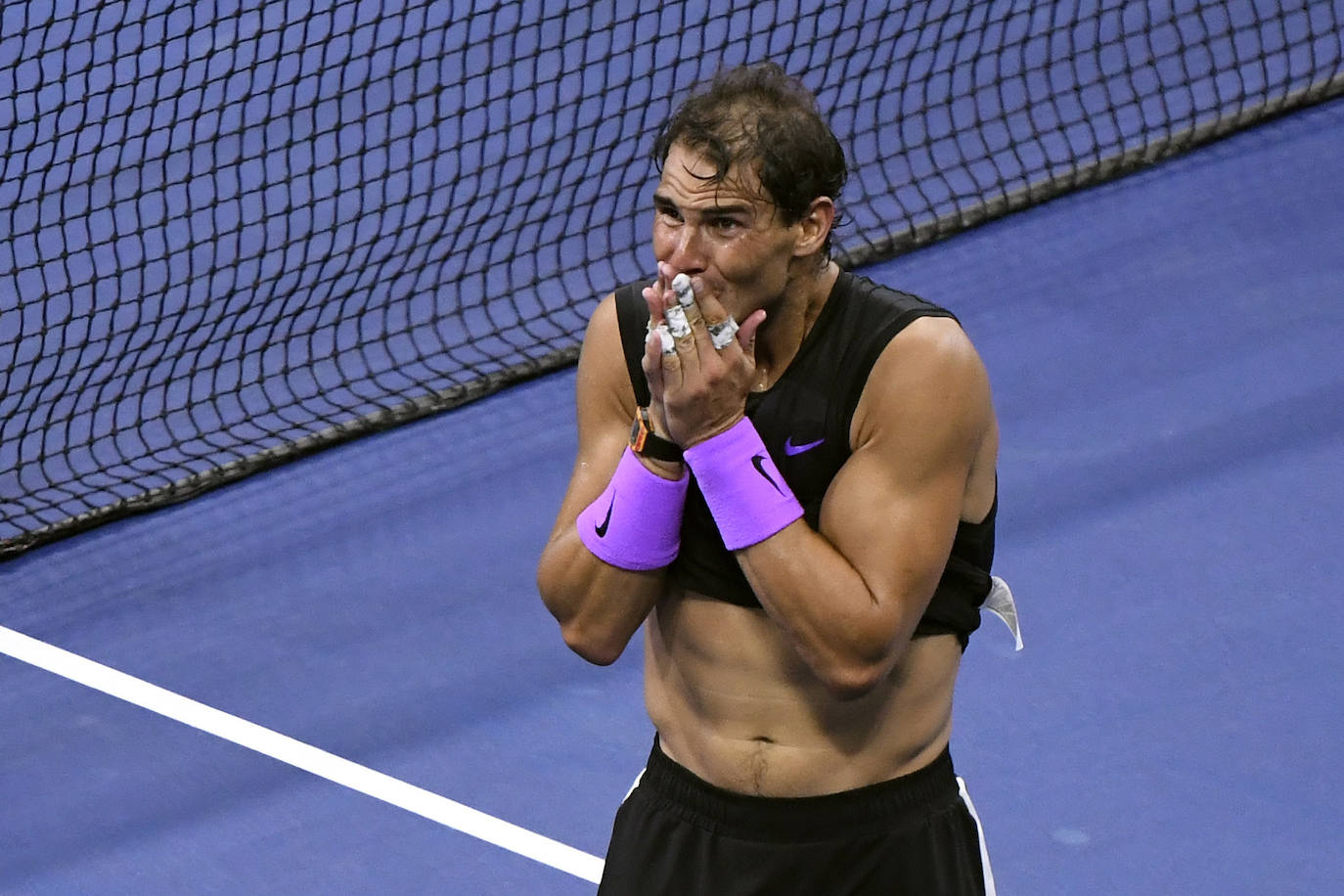 Rafa Nadal celebra su cuarto título del Abierto de Estdos Unidos, que supone su 19ª Grand Slam.