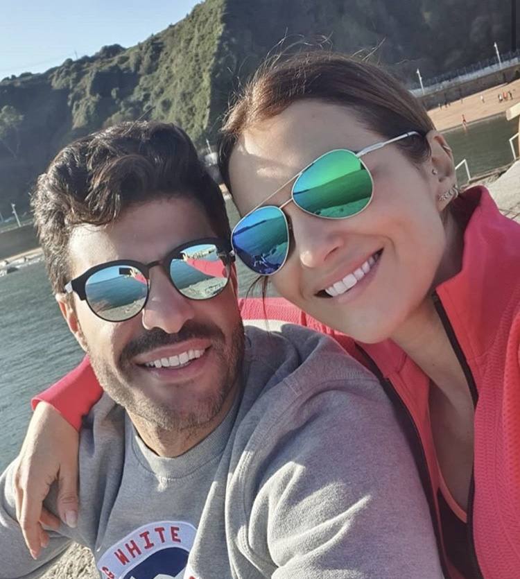 Paula Echevarría y Miguel Torres, en la playa de Candás. 