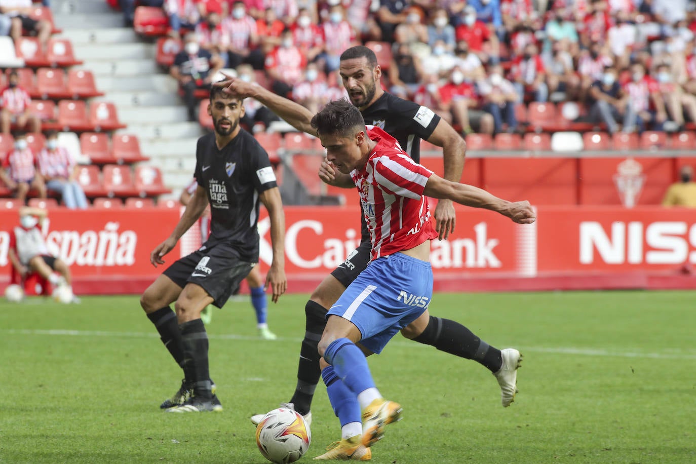 Fotos: Las mejores imágenes del Sporting - Málaga