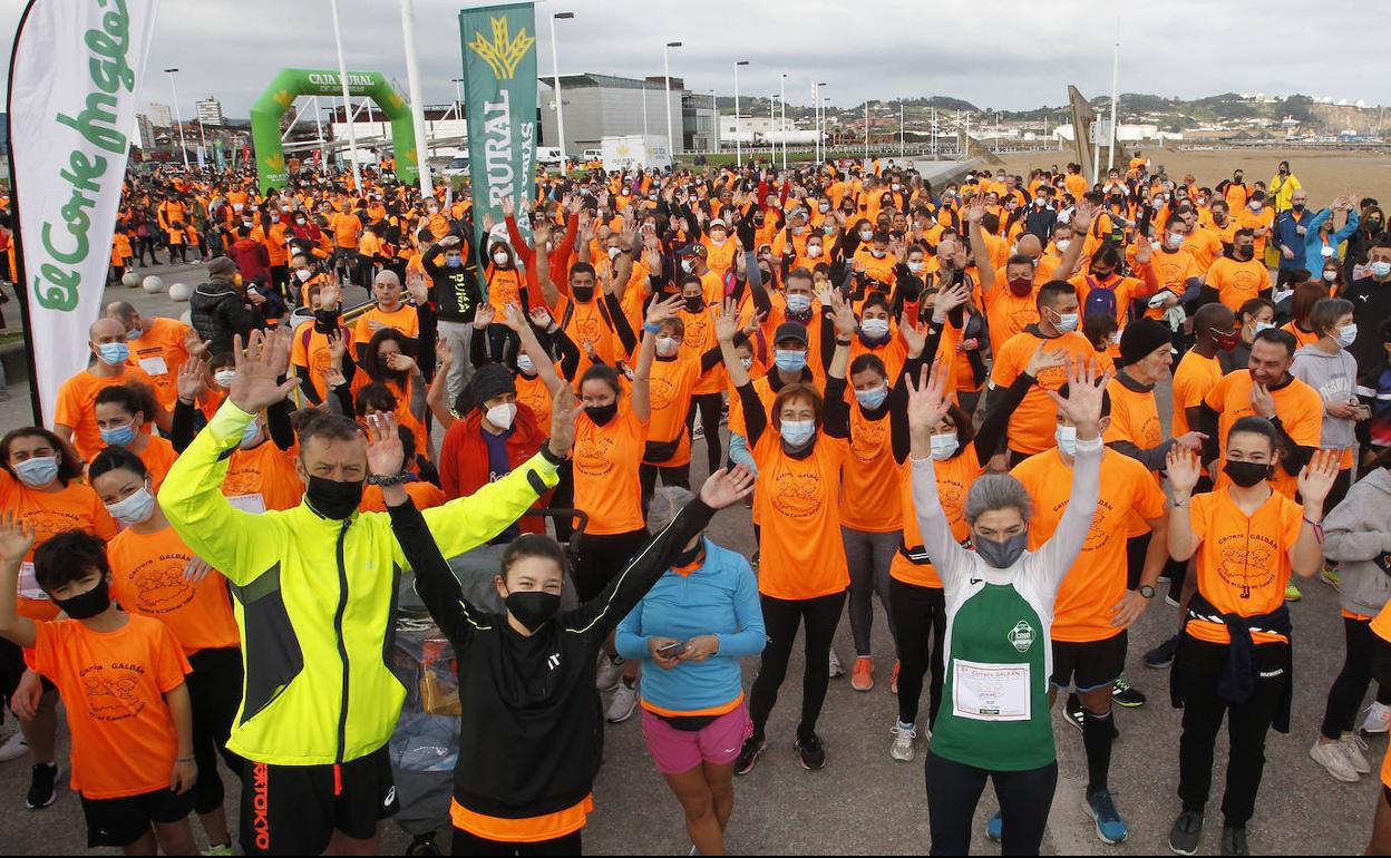 Carrera conra el cáncer infantil organizada por la asociación Galbán en Gijón.