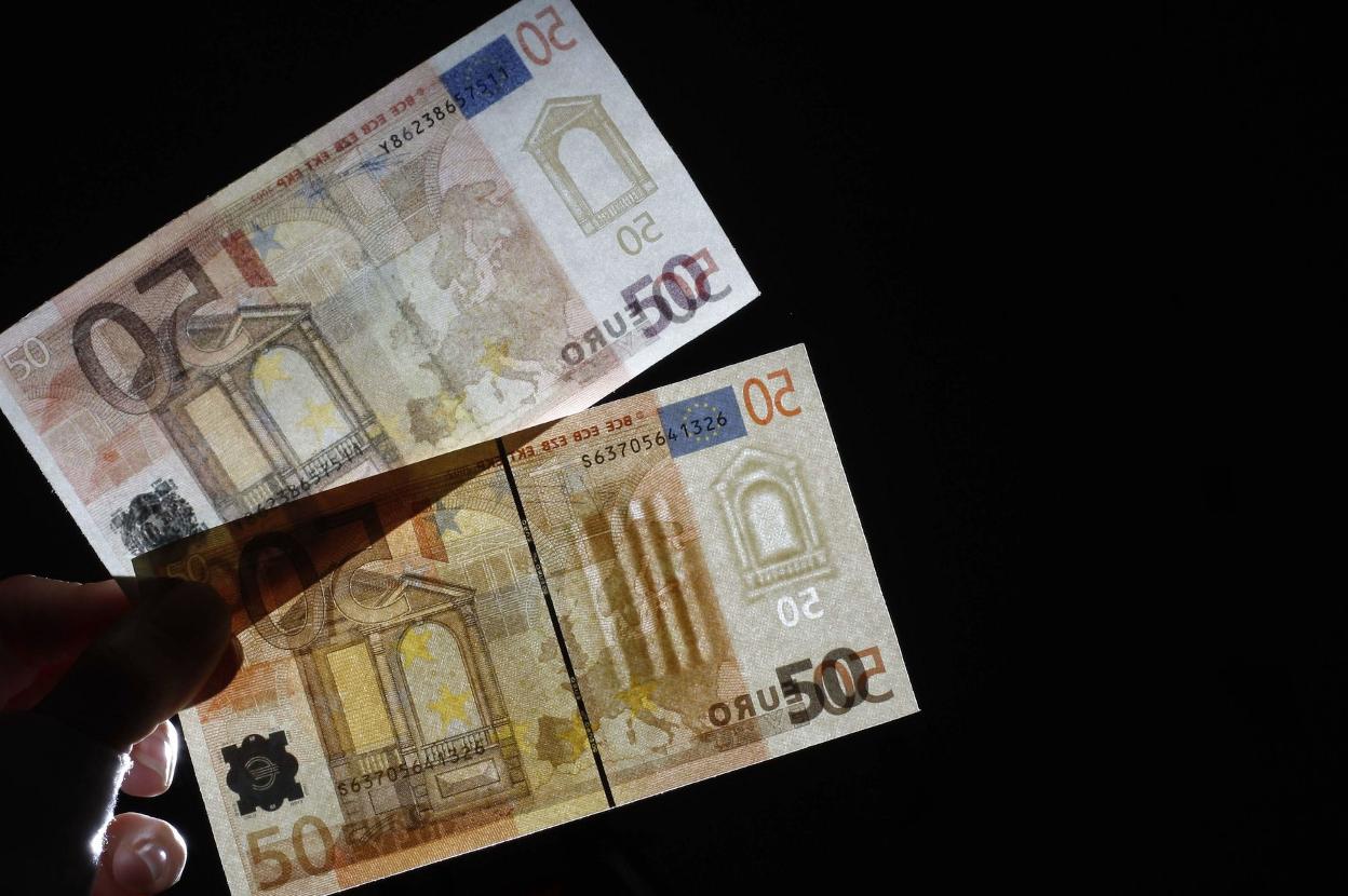 Identificada una mujer que pagó con un billete falso de 50 euros en un  comercio del Carbayedo