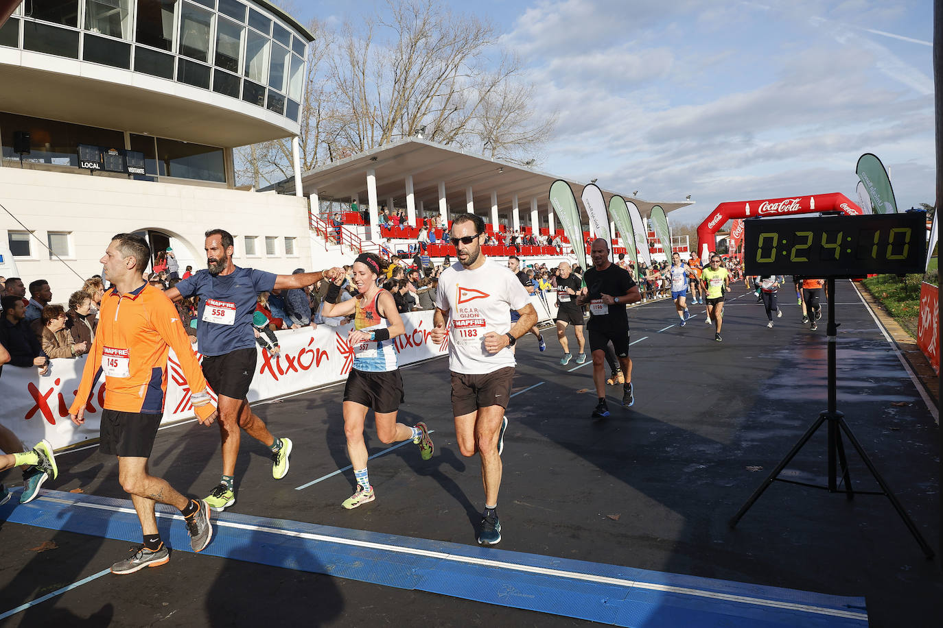 Fotos: ¿Participaste en la Carrera de Nochebuena de Gijón? ¡Búscate!