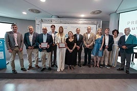 Jorge Pañeda, Ovidio de la Roza, Rogelio Cuesta, Borja Sánchez, Diana Llamazares, María Calvo, Pedro López Ferrer, Ignacio Iglesias, Begoña Fernández-Costales, José Antonio Cases, Sara Menéndez y Rubén Castro, en el acto del Día del Autónomo de la Feria de Muestras.