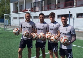 Santamaría, Momoh, Javi Cueto y Natalio, en el entrenamiento del Real Avilés este miércoles en La Toba.