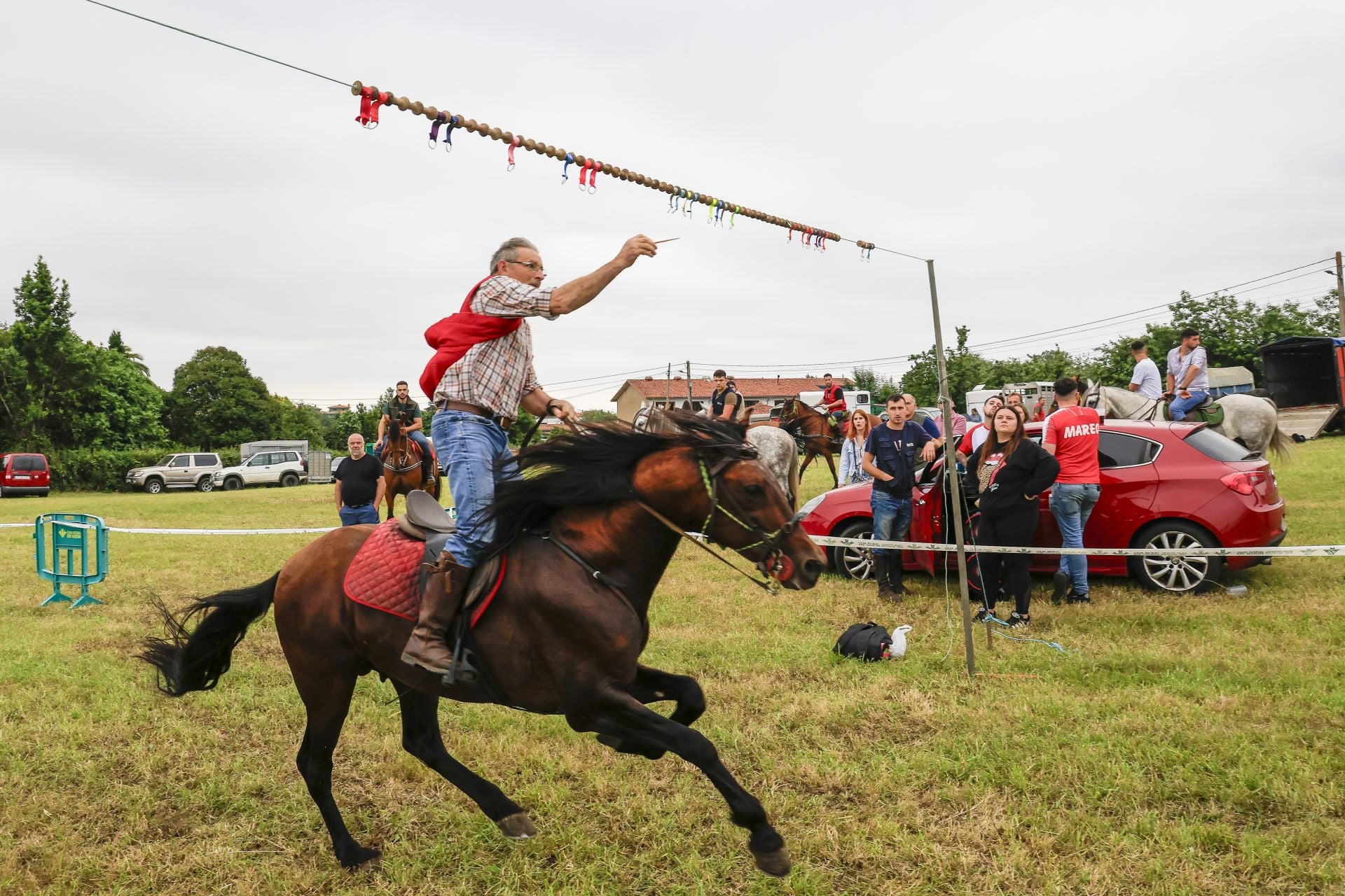Concurso de cinta a caballo en las fiestas de Mareo, en Gijón