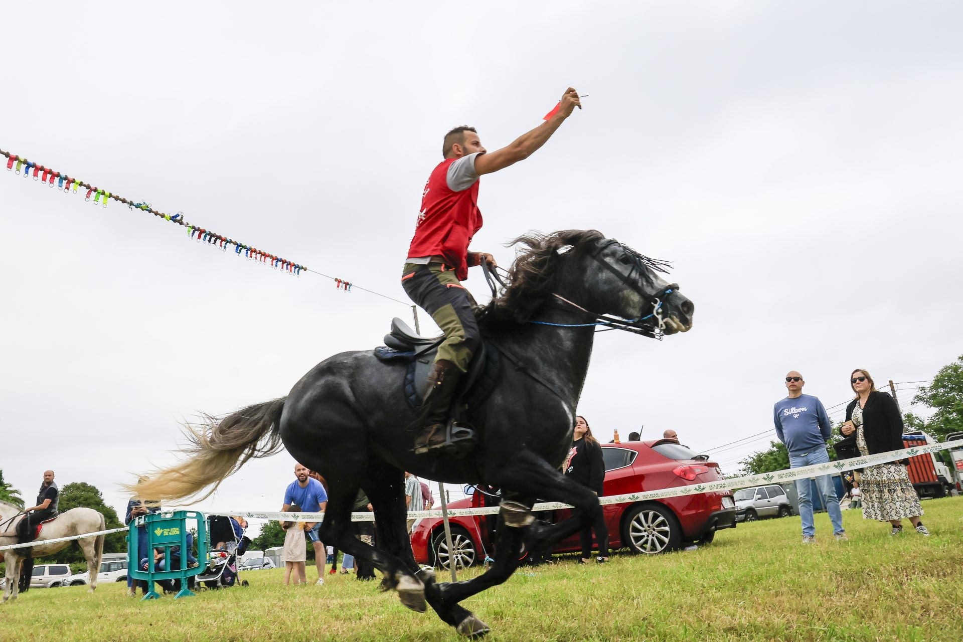 Concurso de cinta a caballo en las fiestas de Mareo, en Gijón