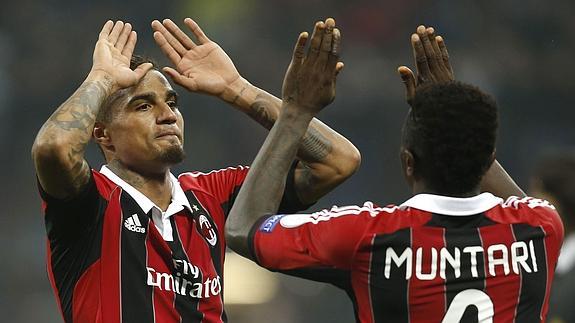 Boateng y Muntari, con el Milan.