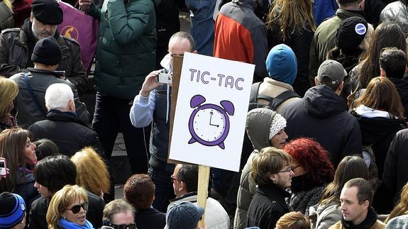 Un cartel con el lema 'Tic-tac'.