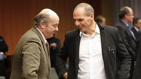 Guindos y su homólogo griego Yanis Varoufakis.