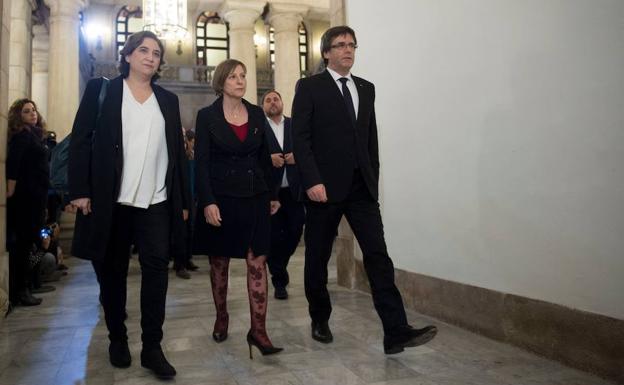 Ada Colau, Carme Forcadell y Carles Puigdemont.