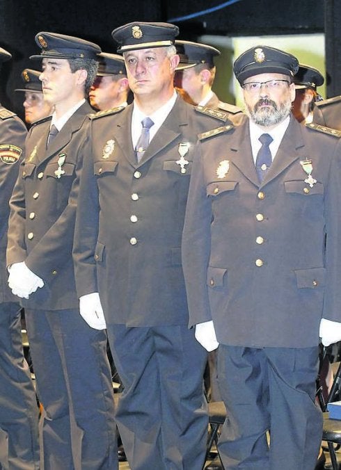 El oficial Fernando Alonso Castañón y los inspectores jefe Fernando Sanz y Eduardo Collado. 