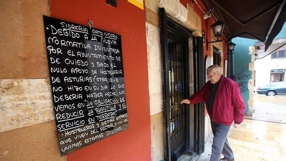 Cartel colocado a la entrada de la sidrería ovetense.