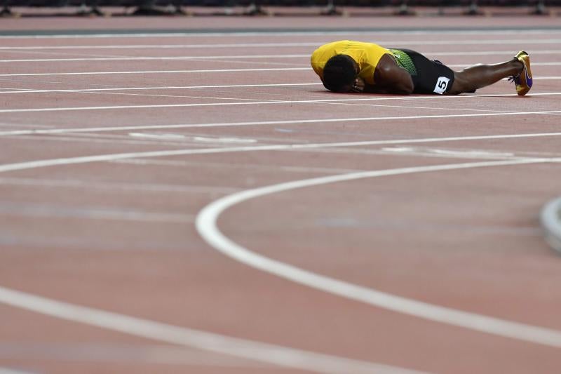 Triste adiós del jamaicano, que se lesionó en su último sprint como profesional en la final de relevos