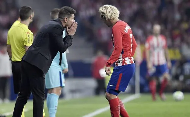 Diego Pablo Simeone y Antoine Griezmann.