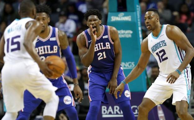 Imagen principal - Embiid y Towns aportan kilos y calidad a las zonas de la NBA. 