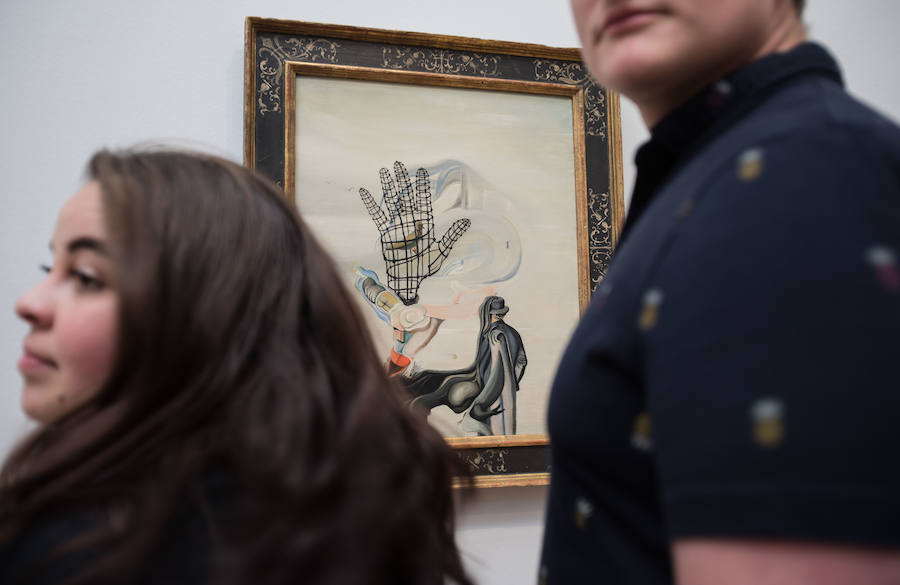 Fotos: Los turistas visitan el Guggenheim y el Bellas Artes en un día pasado por agua