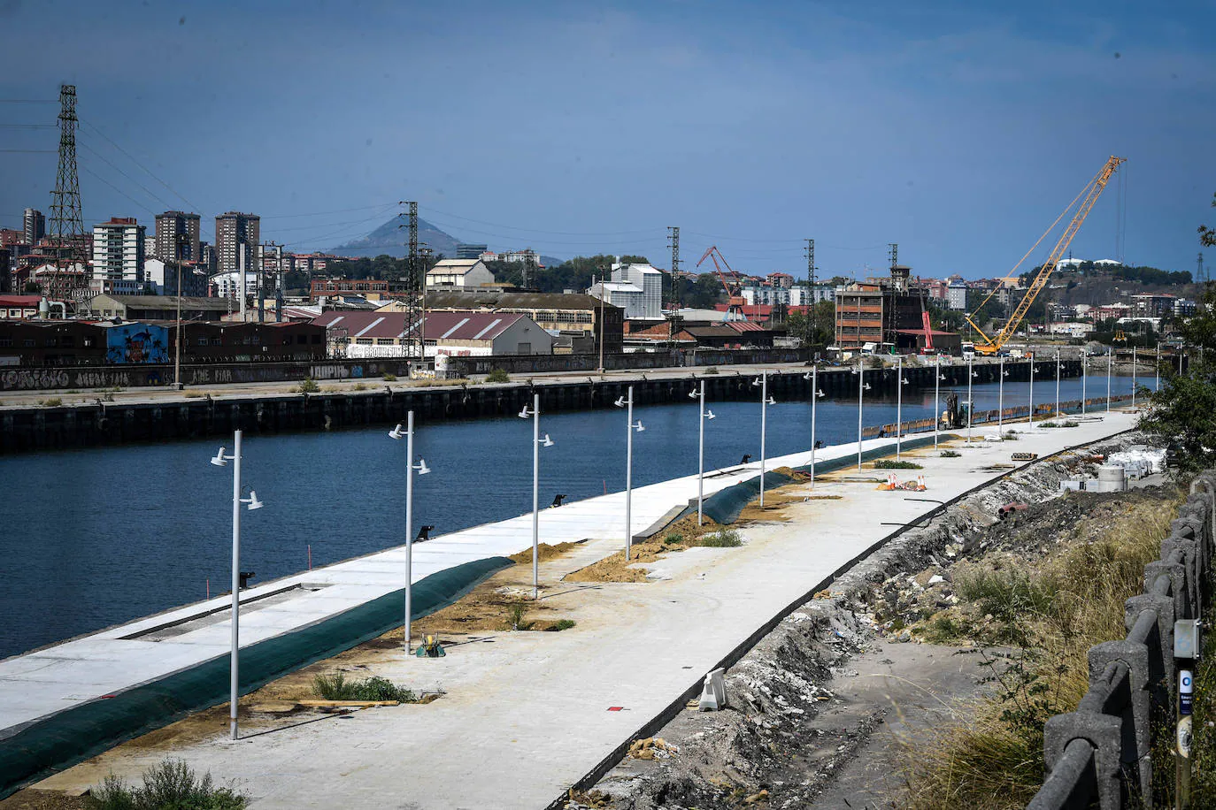 Fotos: El gran paseo que une San Ignacio y Deusto por la ría crece medio kilómetro