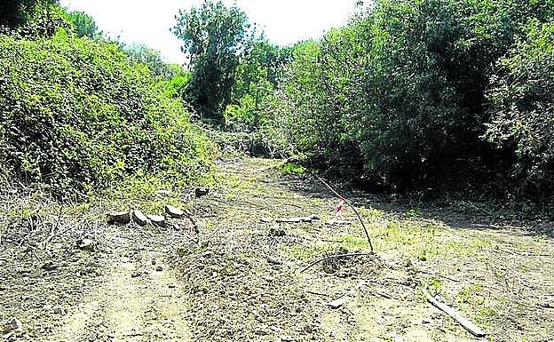 El antiguo cauce enterrado bajo toneladas de tierra
