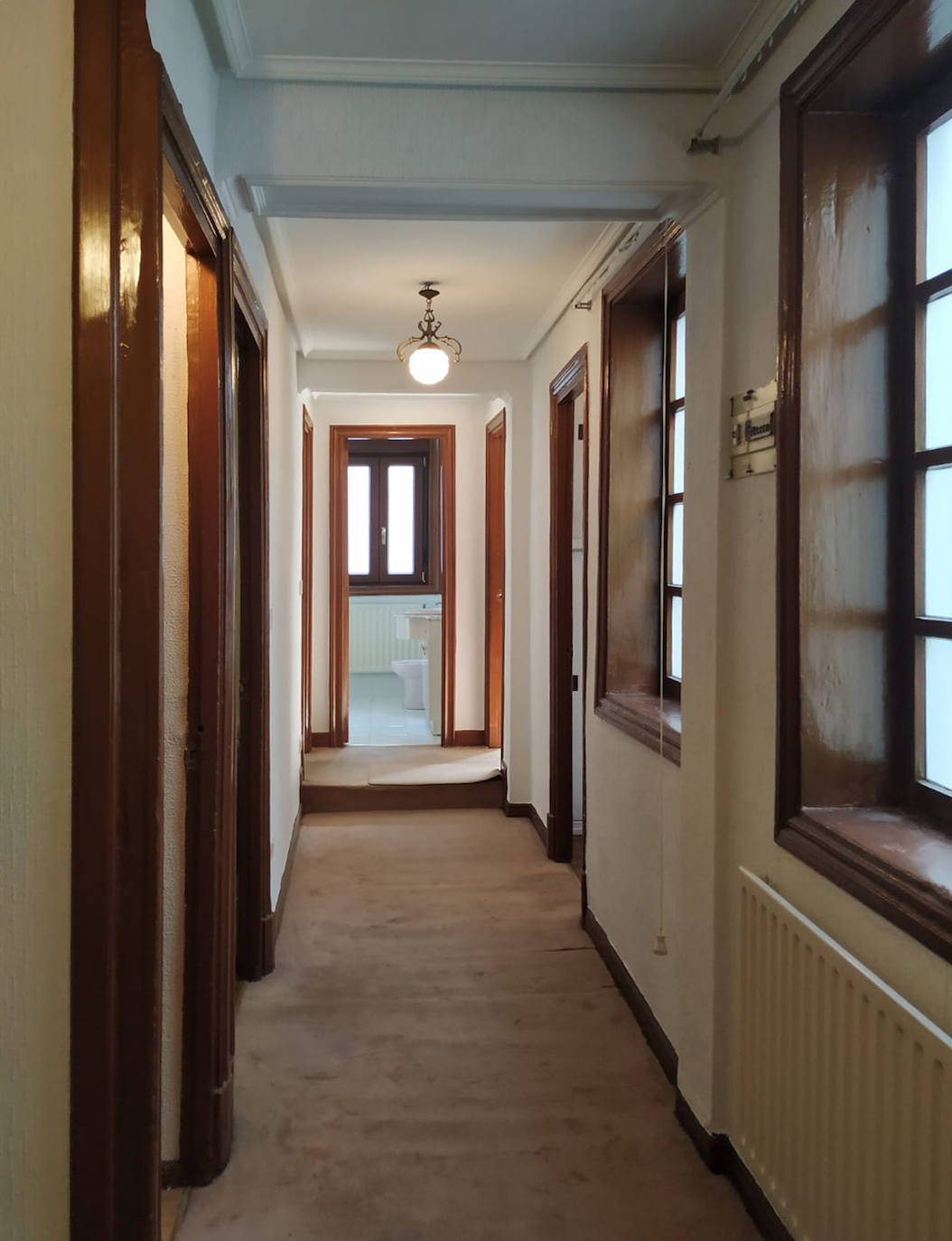 Fotos: Este piso antiguo de Bilbao se ha convertido en un impresionante dúplex minimalista