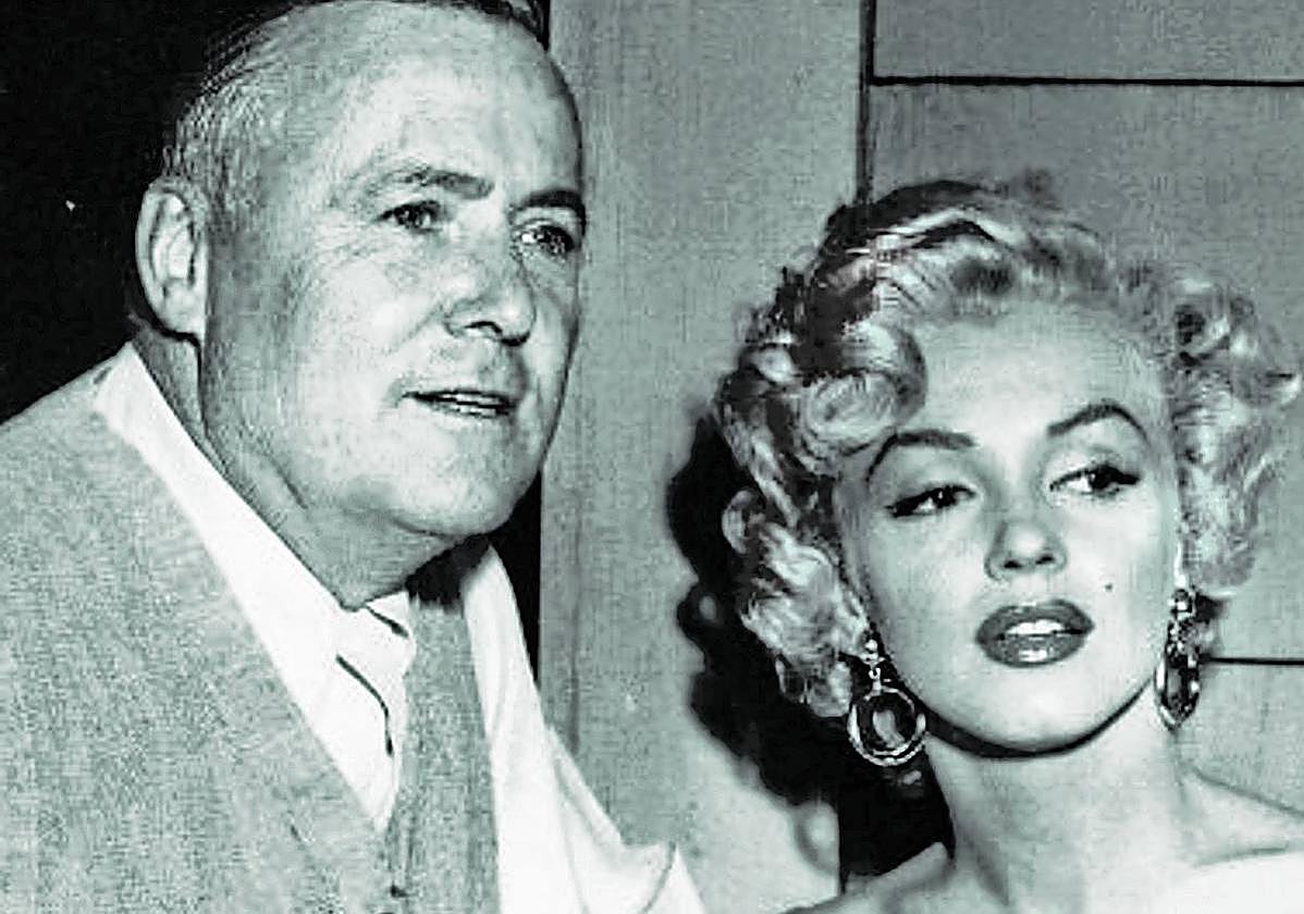 El director estadounidense junto a Marilyn Monroe en un descanso del rodaje de 'Niágara'.