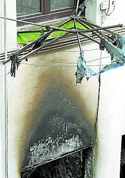 Imagen - Una ventana del bloque incendiado.