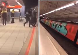 Un grupo de grafiteros pinta los vagones de un metro en la estación de Ibarbengoa