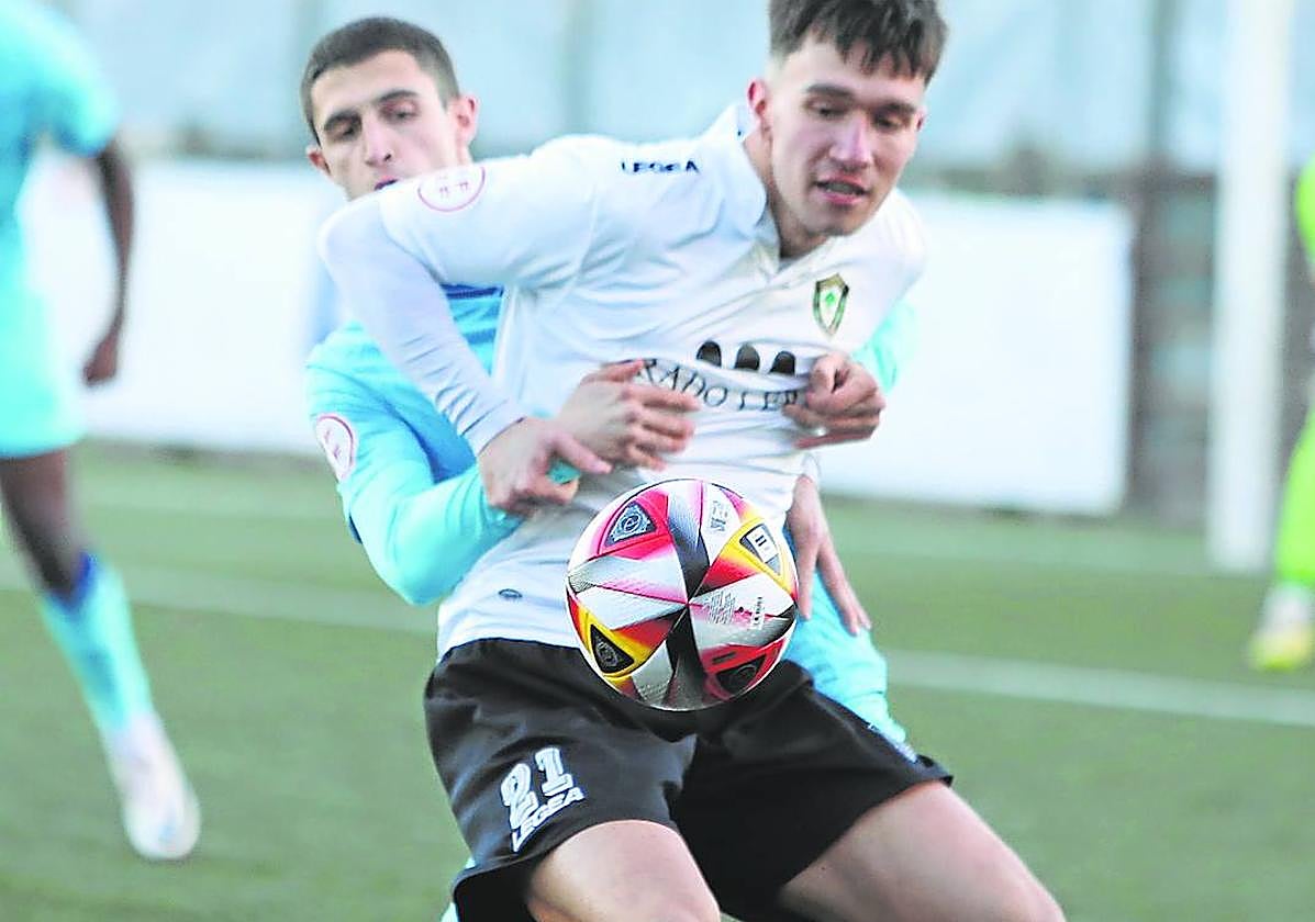 Un lance del partido.