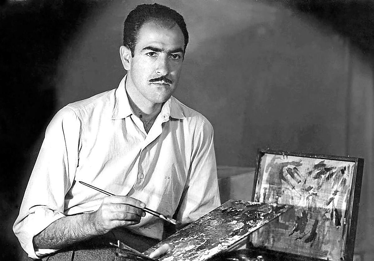 Imagen del artista con sus útiles de pintura en plena juventud.