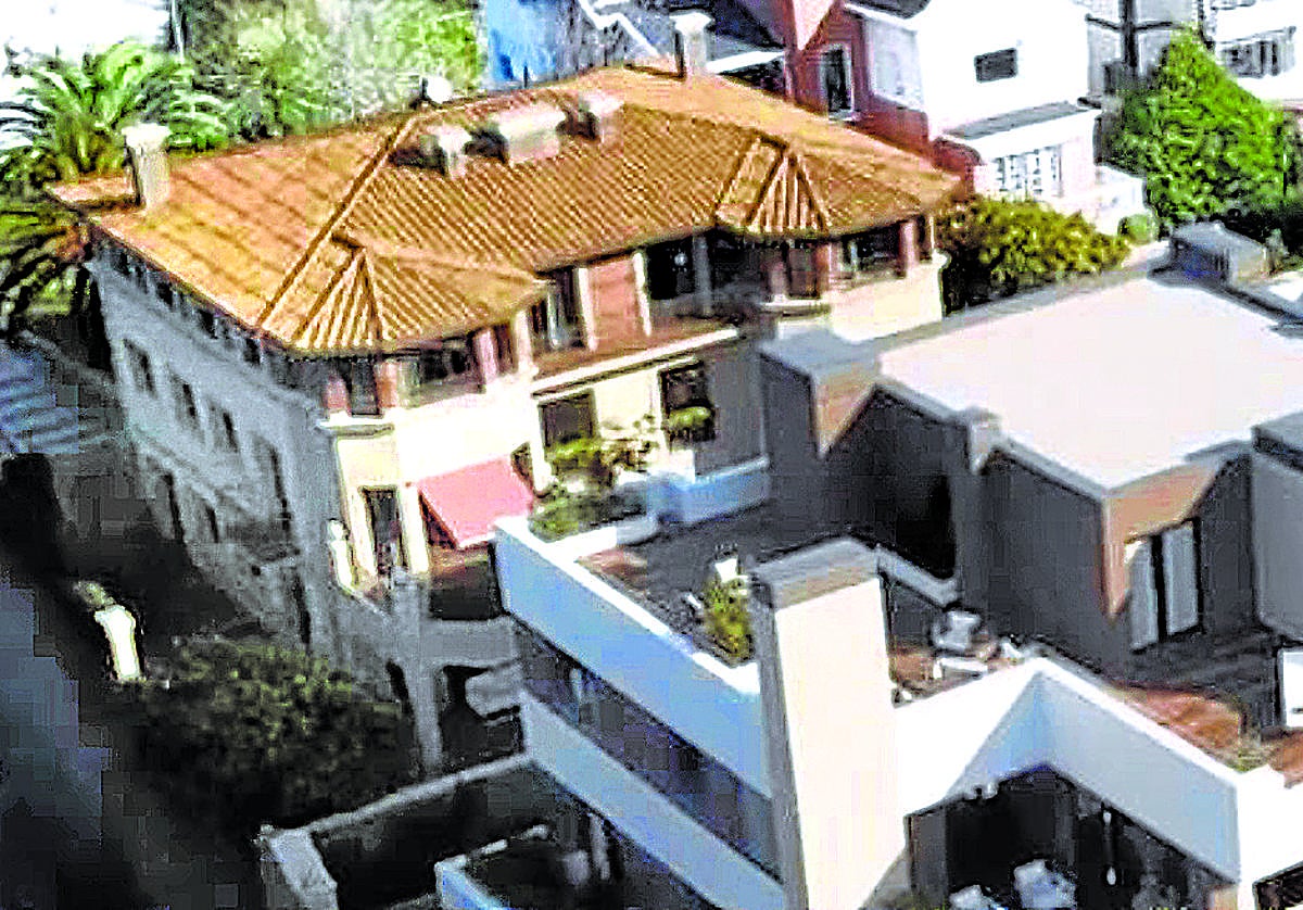 Recreación del proyecto de 12 viviendas de lujo comercializado y en el que se observa la rehabilitación del palacete.