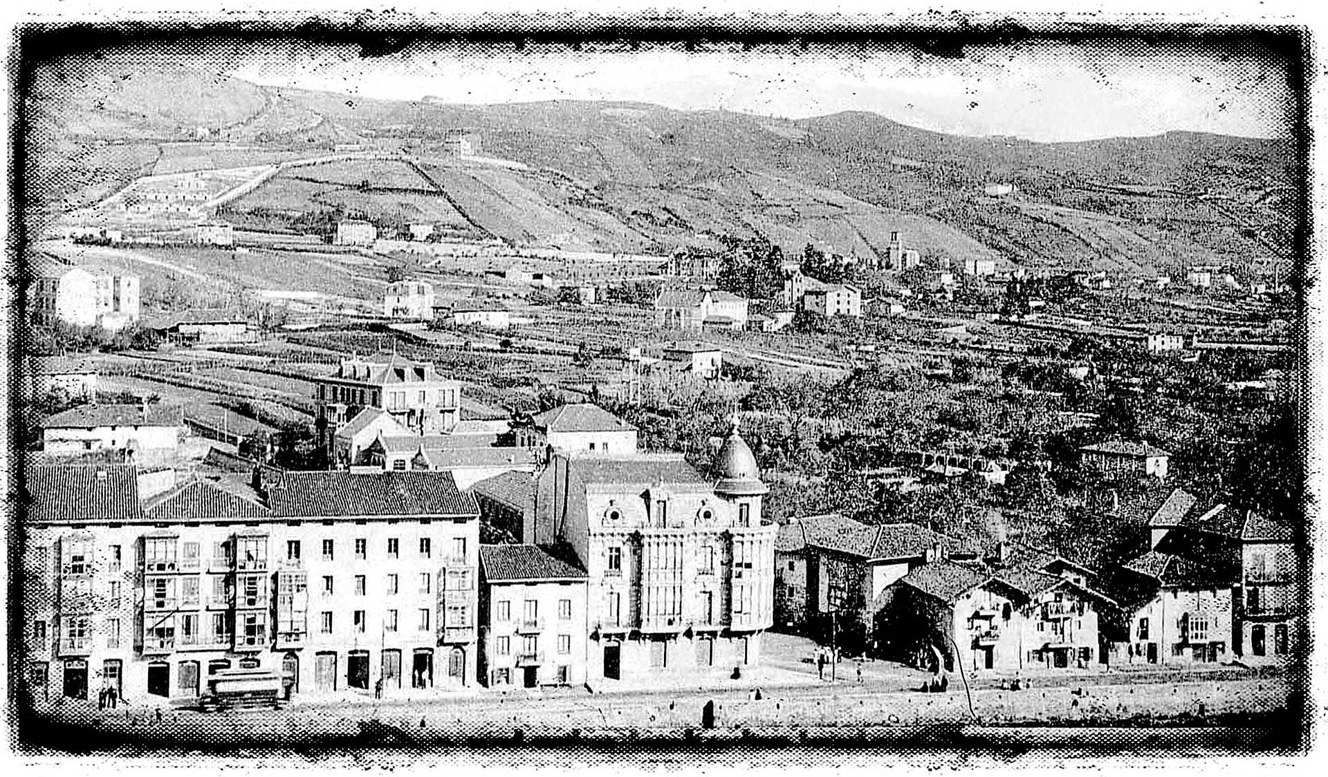 Deusto, con la ribera en primer plano, en una postal de principios del siglo XX.