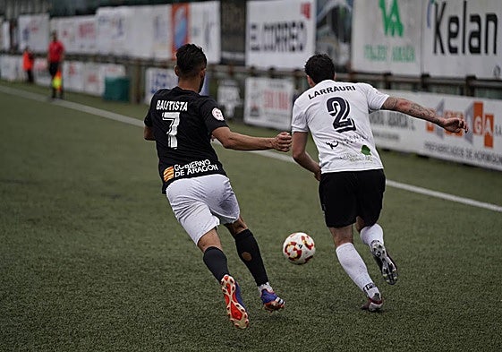 Un lance del partido.