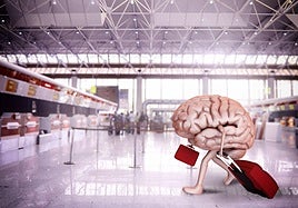 Un cerebro con equipaje en el aeropuerto.