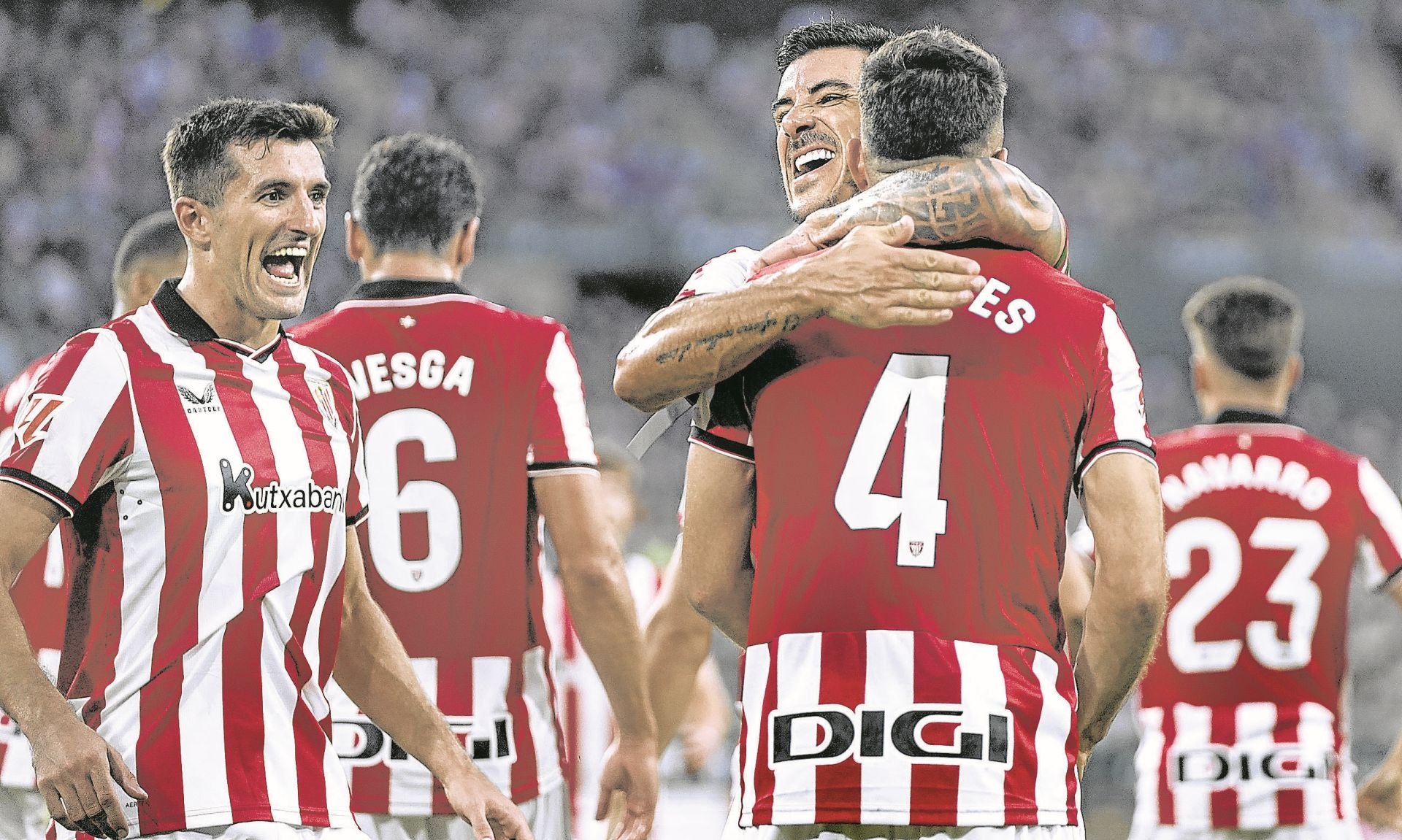 Berchiche abraza a Paredes en presencia de Vivián tras el 0-2 frente al Betis en La Cartuja