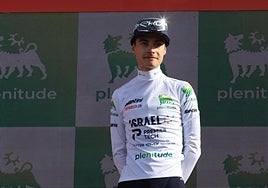 Matthew Riccitello, en el podio de la Bola del Mundo, en la 20ª etapa de la Vuelta.