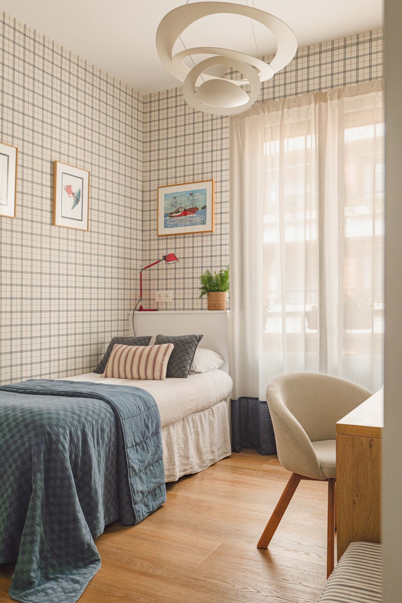 De espacio cerrado a hogar luminoso: la metamorfosis de un piso en Bilbao para una familia con dos niños