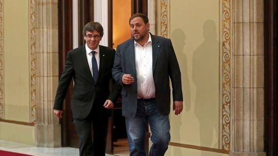 Carles Puigdemont y Oriol Junqueras. 