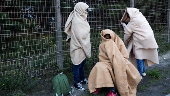 Varios inmigrantes en Calais.