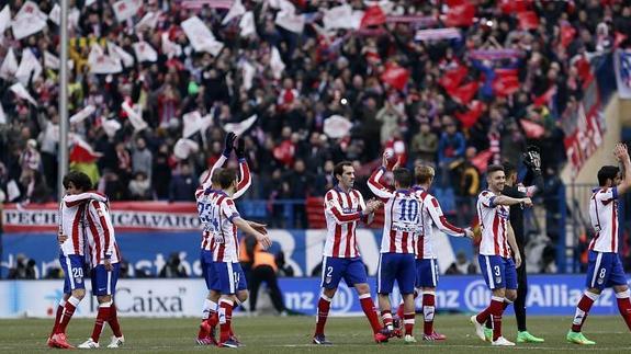 Los jugadores del Atlético festejan la goleada.