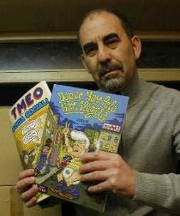 El dibujante Kini, con las novedades del TMEO. / J. MONTES