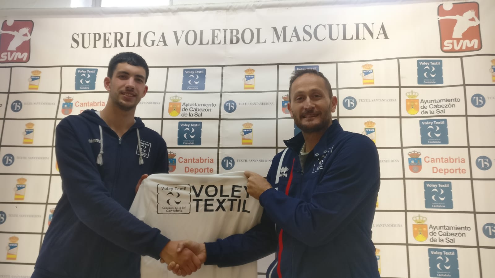 Ángel Rodríguez y el técnico José Ignacio Marcos.