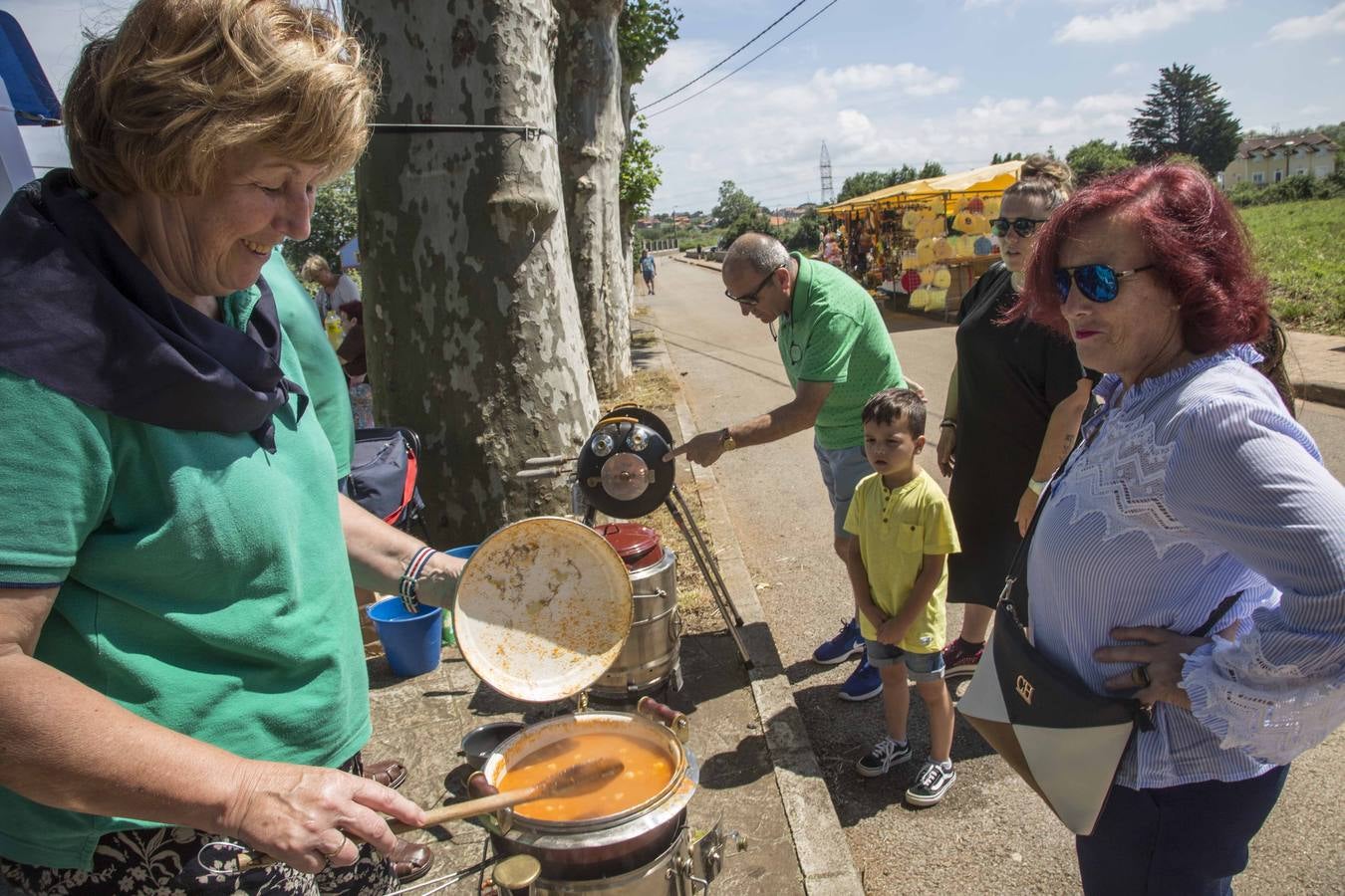 Imágenes del pregón, del concurso de ollas ferroviarias y de la paella solidaria de las fiestas de la Virgen del Carmen de Camargo