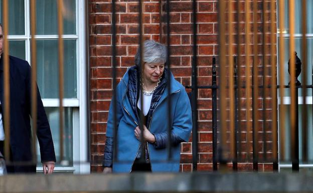 Theresa May, abandonando su residencia oficial.